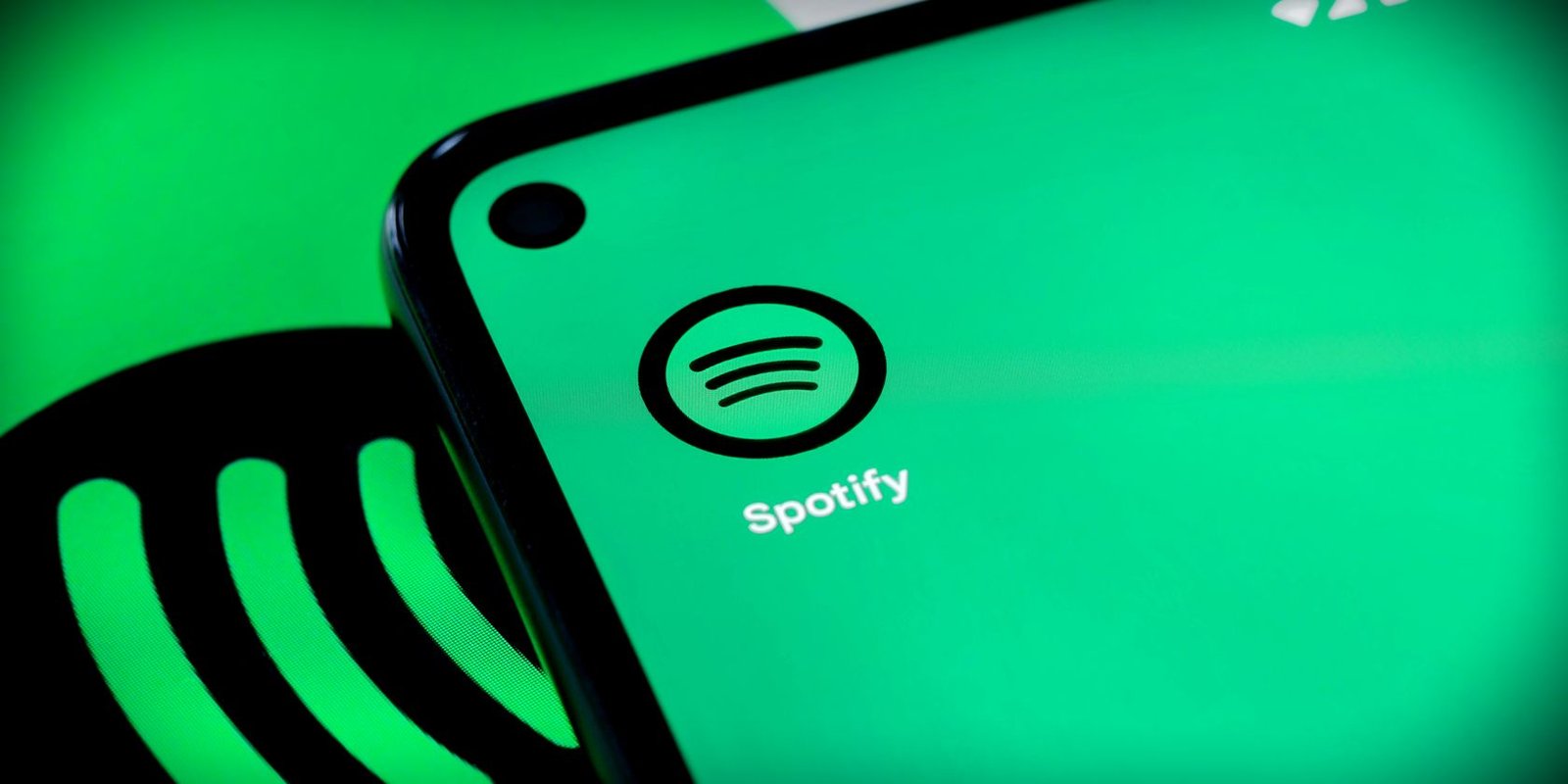 Desarrollador Web Freelance | Wordpress | | spotify logo on mobile phone feature